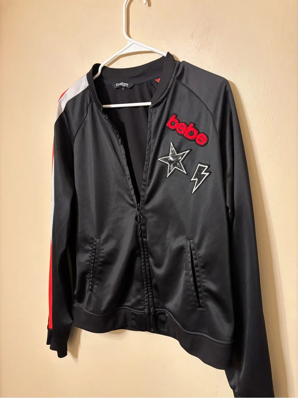 bebe sport Black Bomber Jacket with Red and White Sleeve Stripes size L